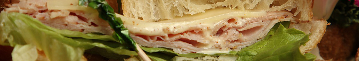Eating Sandwich at Berres Brothers Coffee Roasters restaurant in Watertown, WI.